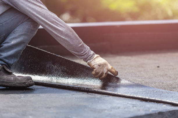 Professional Basement Waterproofing technician working in Grand Rapids, OH